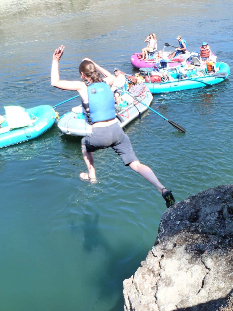 https://riverbent.com/wp-content/uploads/2022/07/Woman-leaping-from-rock-into-Lower-Salmon-river.jpg