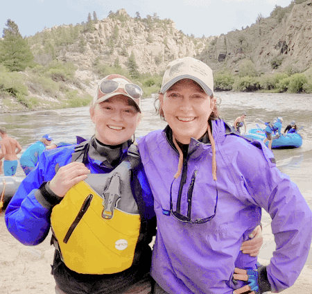 Two women in kayaking clothes